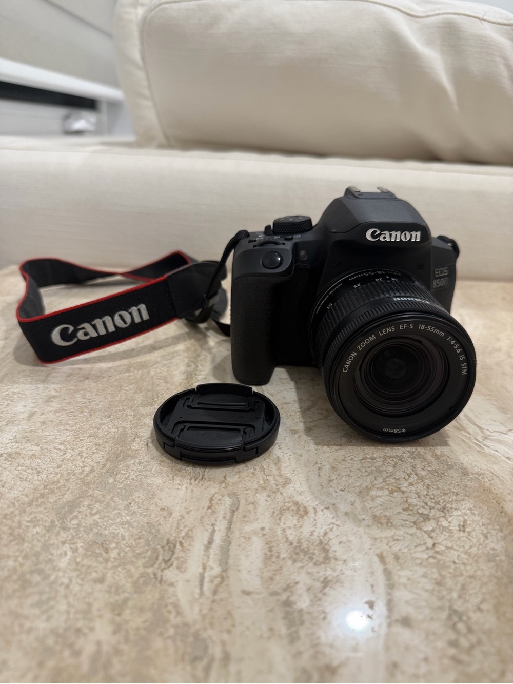 Canon Black DSLR Camera with 18-55mm Lens and Branded Strap